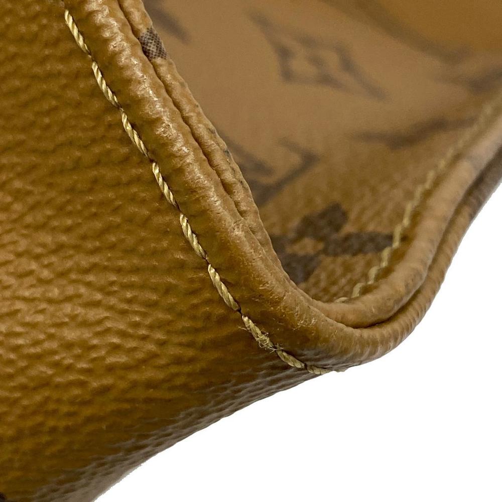 Louis Vuitton Monogram Reverse On the Go GM Two-Way Bag - Image 4